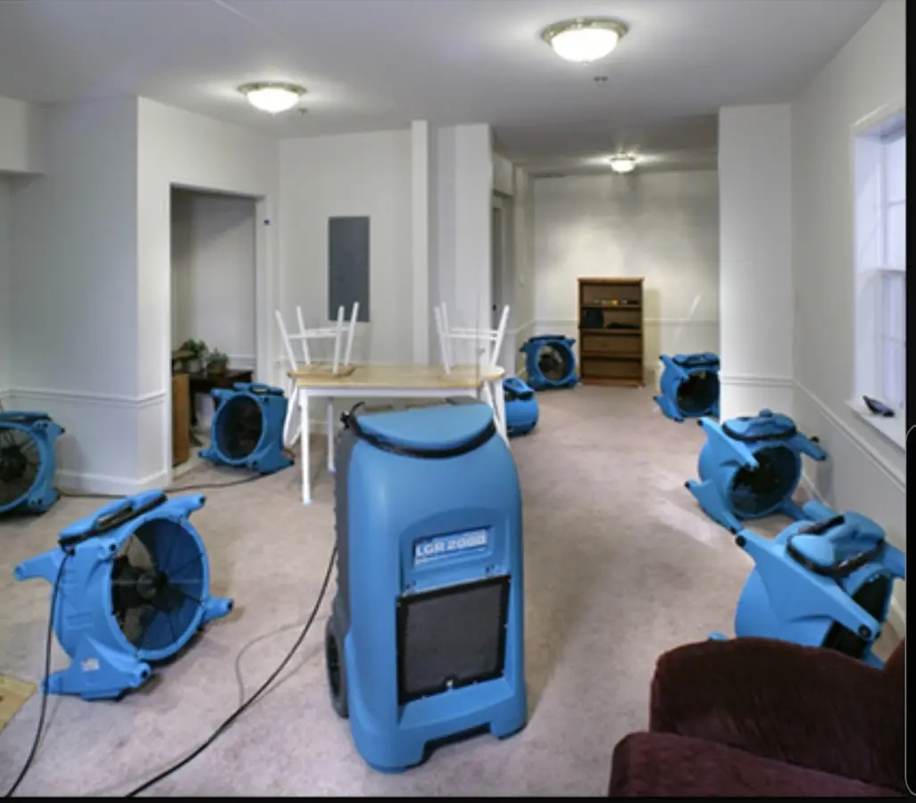 Air movers and dehumidifier setup for Water Damage Restoration in Murraysville